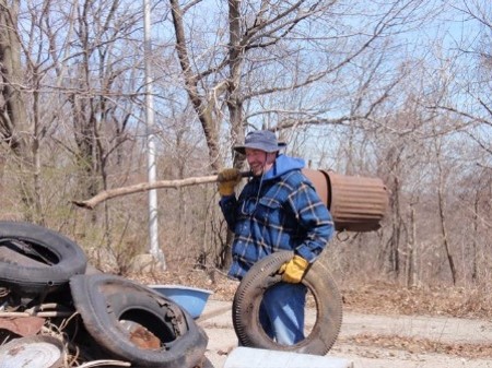 Cleaning up leftovers from past human use - Hilltop Reservation